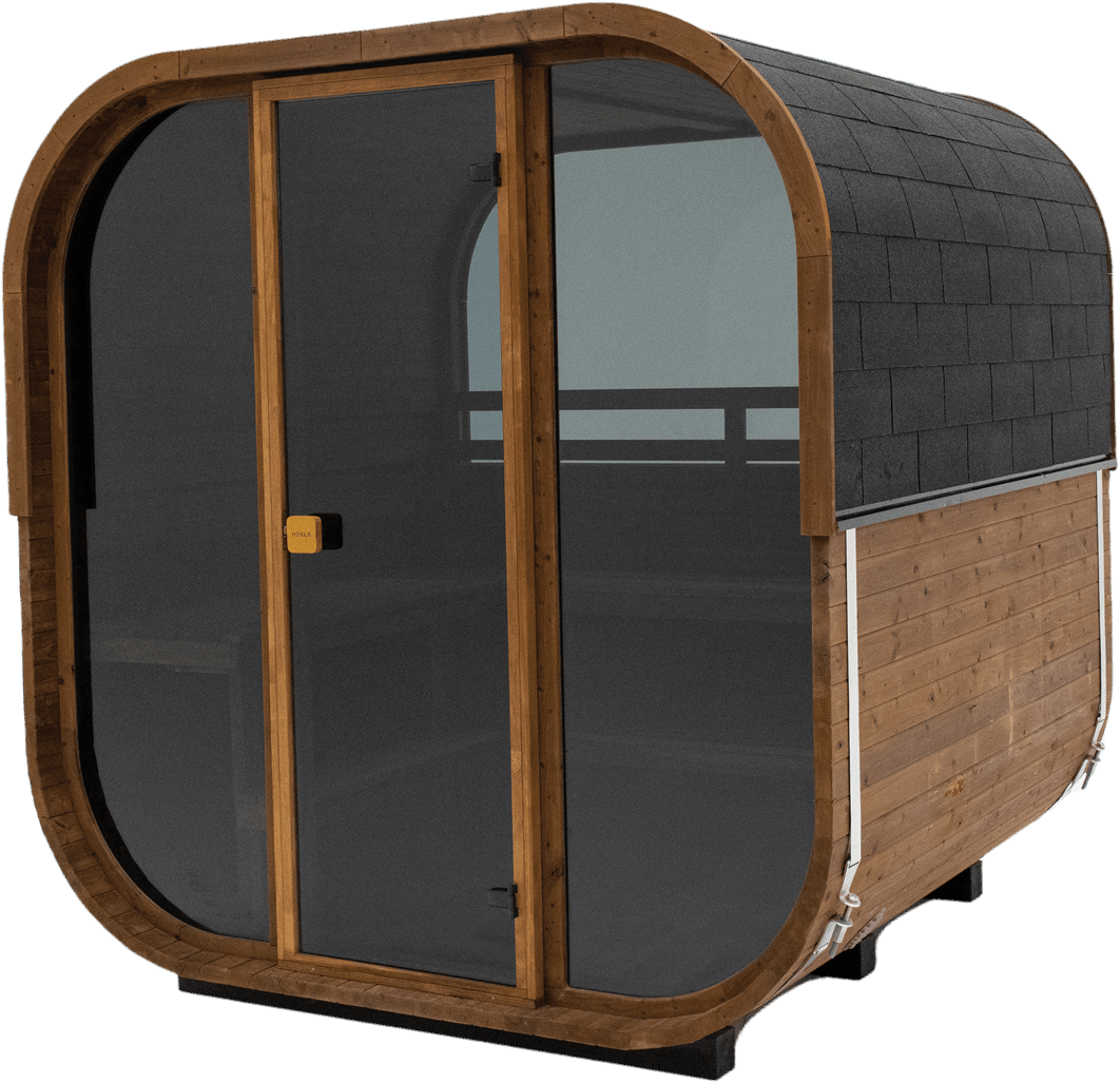Outdoor wooden sauna with glass door